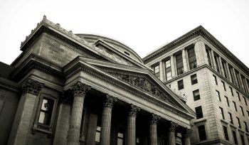 Historic financial institution building symbolising the changing approach sophisticated investors are taking toward income, capital preservation, and alternative investments