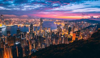 Hong Kong skyline at dusk, viewed from Victoria Peak, illustrating estate planning considerations for expatriates living in Hong Kong