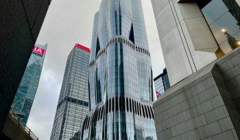 Hong Kong financial district skyscrapers - private credit investment opportunities for expat investors