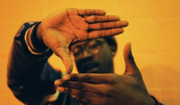 man doing hand gesture