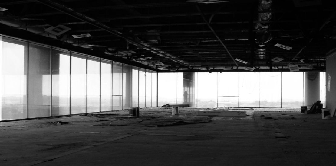 grayscale photo of a building showing what happens when there is no business succession planning