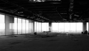 grayscale photo of a building showing what happens when there is no business succession planning