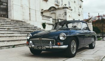 blue coupe near gray concrete staircase Estate Planning for Car Collectors